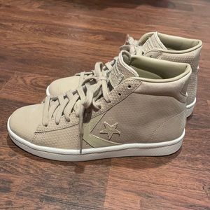 Never worn converse sneakers with mild wedge.